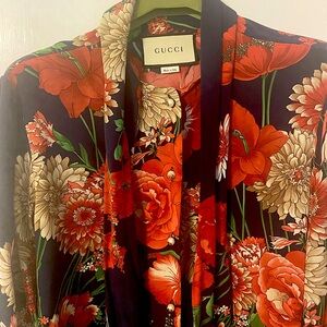 Gucci floral print silk bow blouse.